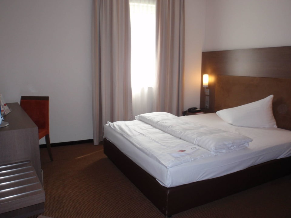 Zona Cama a la llegada IntercityHotel Mainz