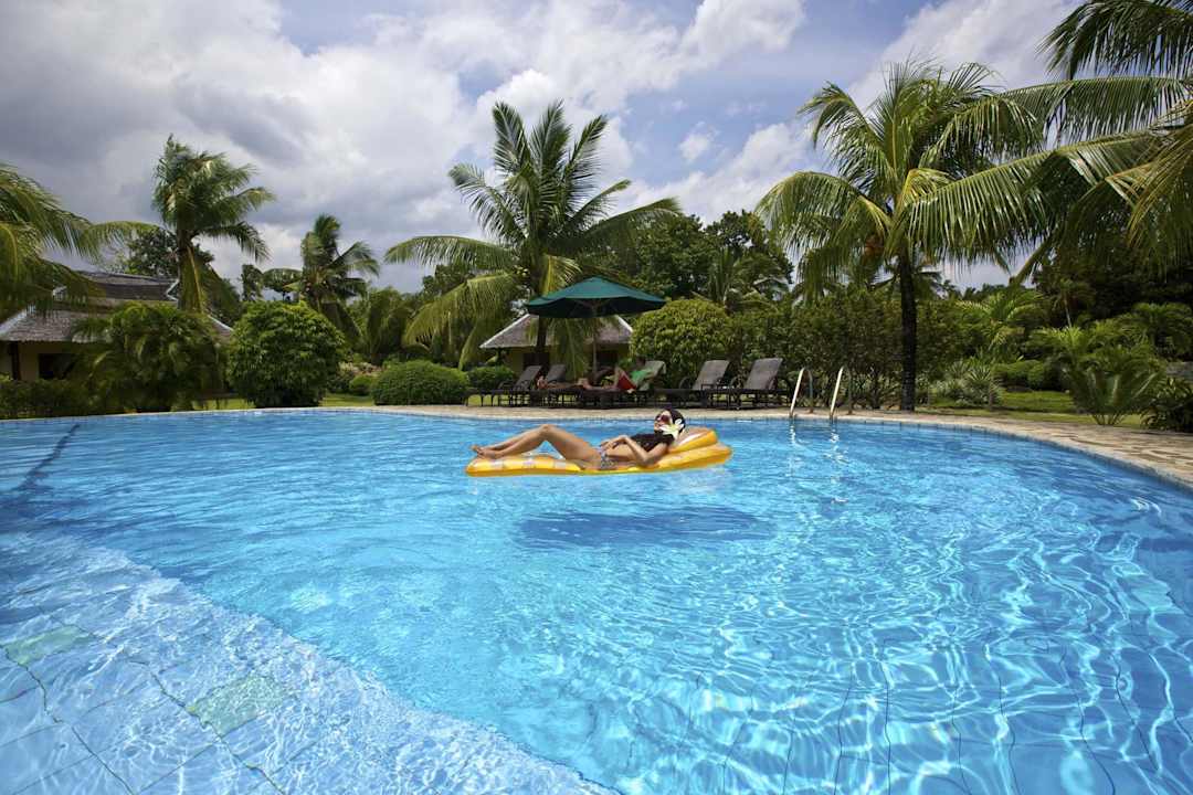 Large swimming pool w. model Hotel Amontillado Resort
