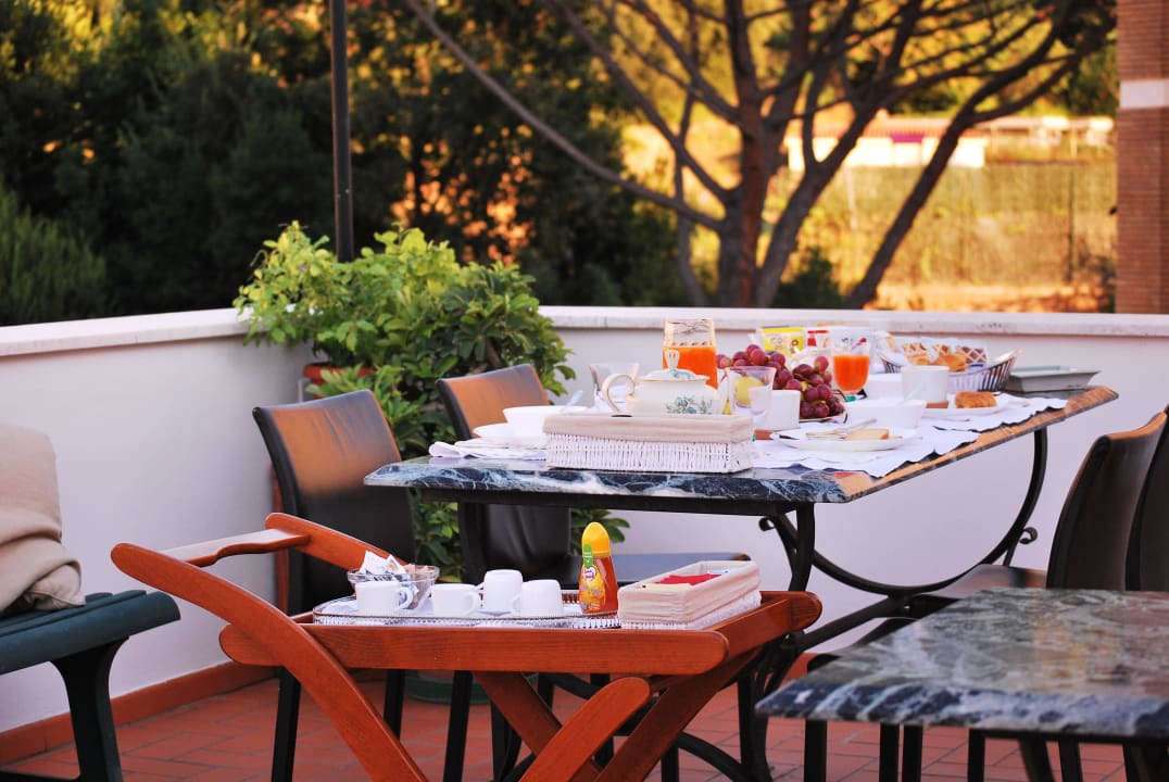Colazione sulla terrazza- Breakfast on the terrace Attico 203
