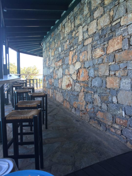 An der Poolbar Domes Aulus Elounda All-Inclusive Resort, Curio Collection by Hilton