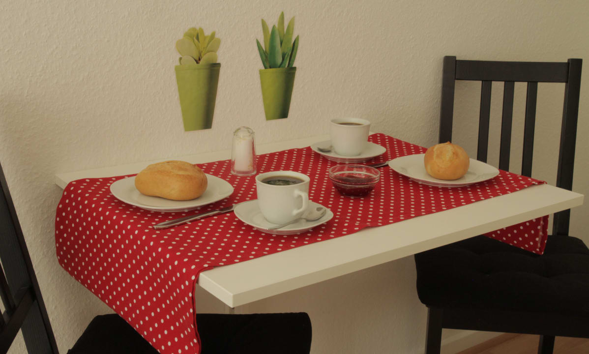 Frühstücksecke Apartment Bett am Rhein