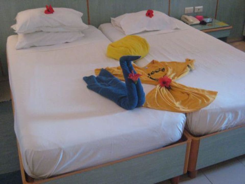 Bett mit Motiv Calimera Yati Beach