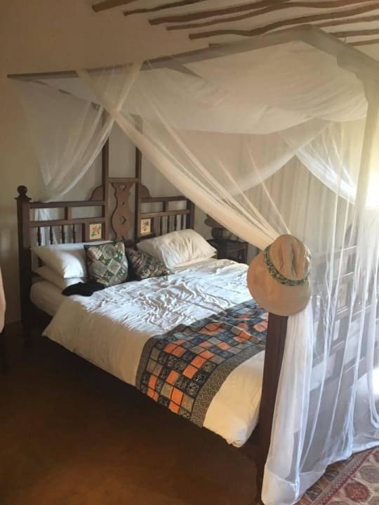 Himmelbett mit Moskitonetz Neptune Palm Beach Boutique Resort & Spa