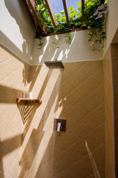 Outdoor rainshower at a Watersedge Cottage Calabash Cove Resort & Spa