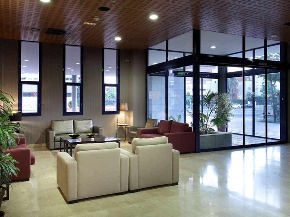 Recepcion Hotel Exe Sevilla Palmera
