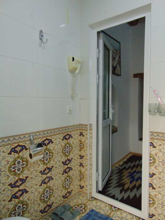 Zimmer Madrasah Polvon-Qori Boutique