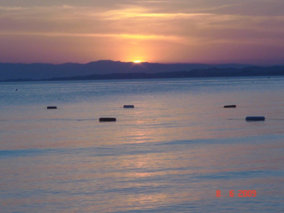 Sonnenuntergang Clover Magic Nova Beach