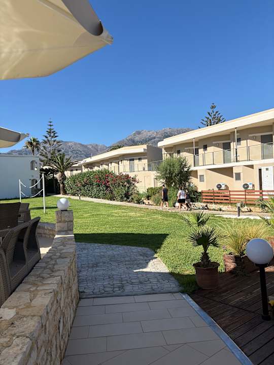 Gartenanlage HARPIN Happy Days Beach Hotel