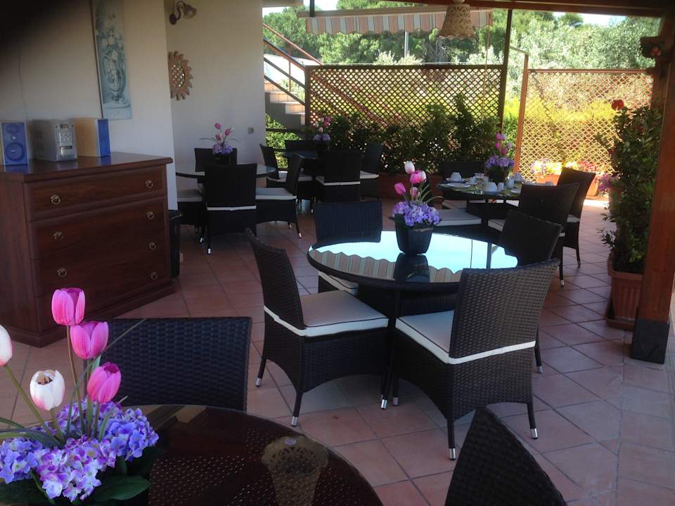 Sala colazioni esterna Holiday Home Perla Del Mare