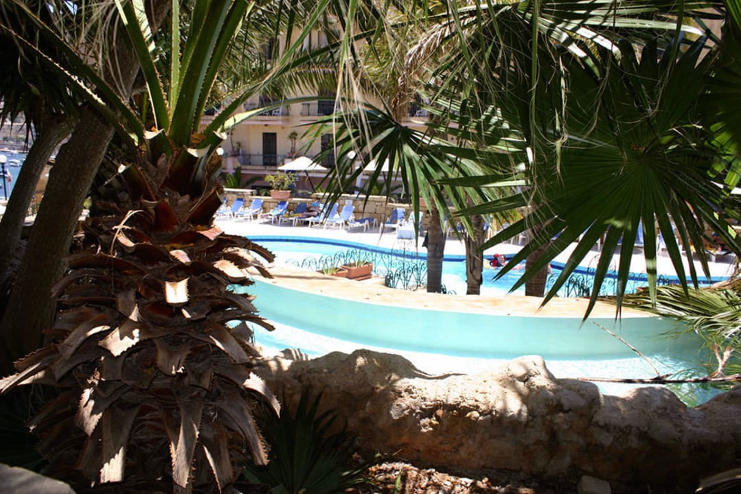 Outdoor Swimming Pool Area at Porto Azzurro Hotel Porto Azzurro Resort
