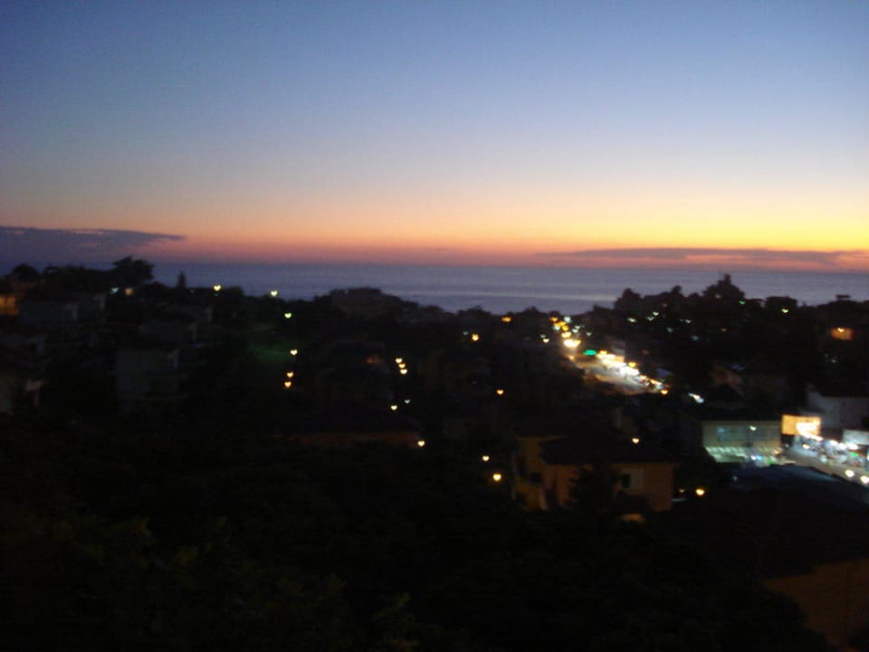 Sonnenuntergang von der Speiseterrasse aus Hotel Club Paradiso