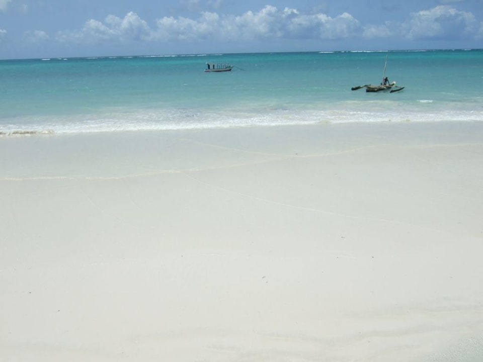 Strand bei Ebbe Neptune Palm Beach Boutique Resort & Spa
