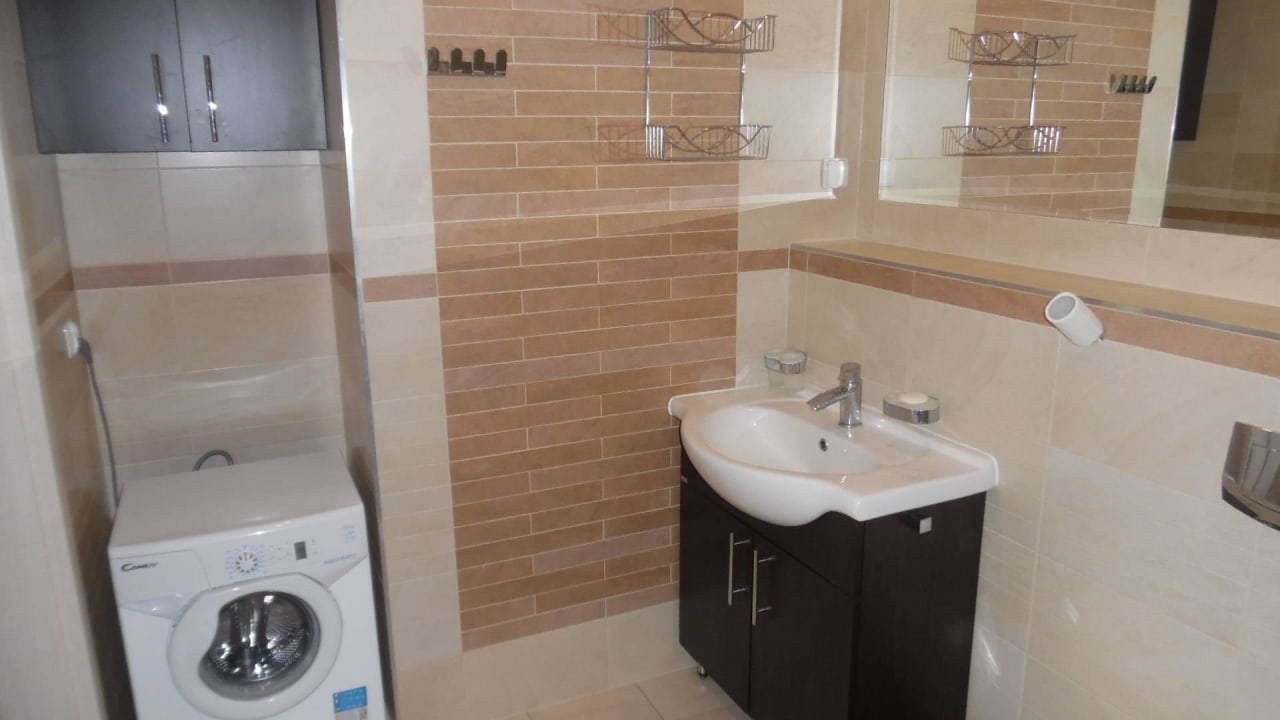 Badezimmer mit Waschmaschine Apartamenty Feniks
