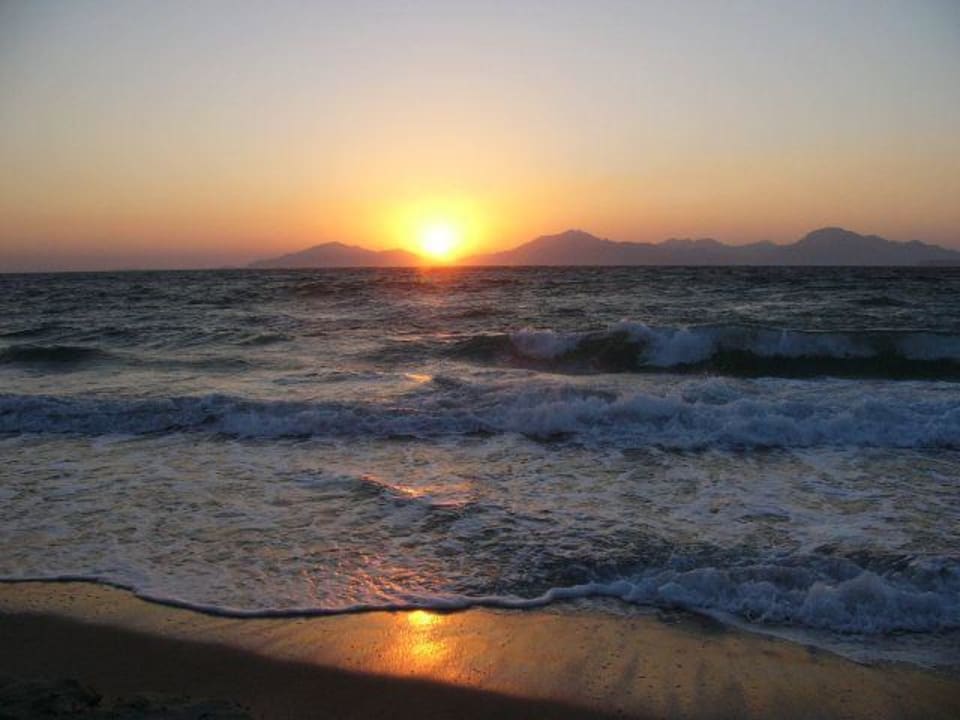 Zachód słońca Sandy Beach Hotel & Family Suites