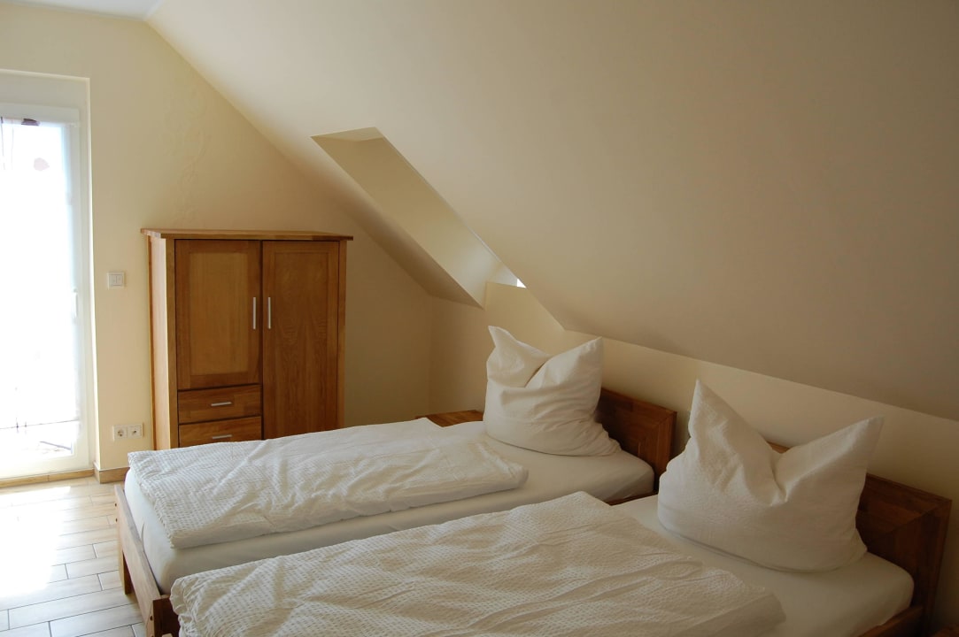 Ferienwohnung Dachgeschoss, 1 Schlafzimmer Ferienwohnung am Mühlstein