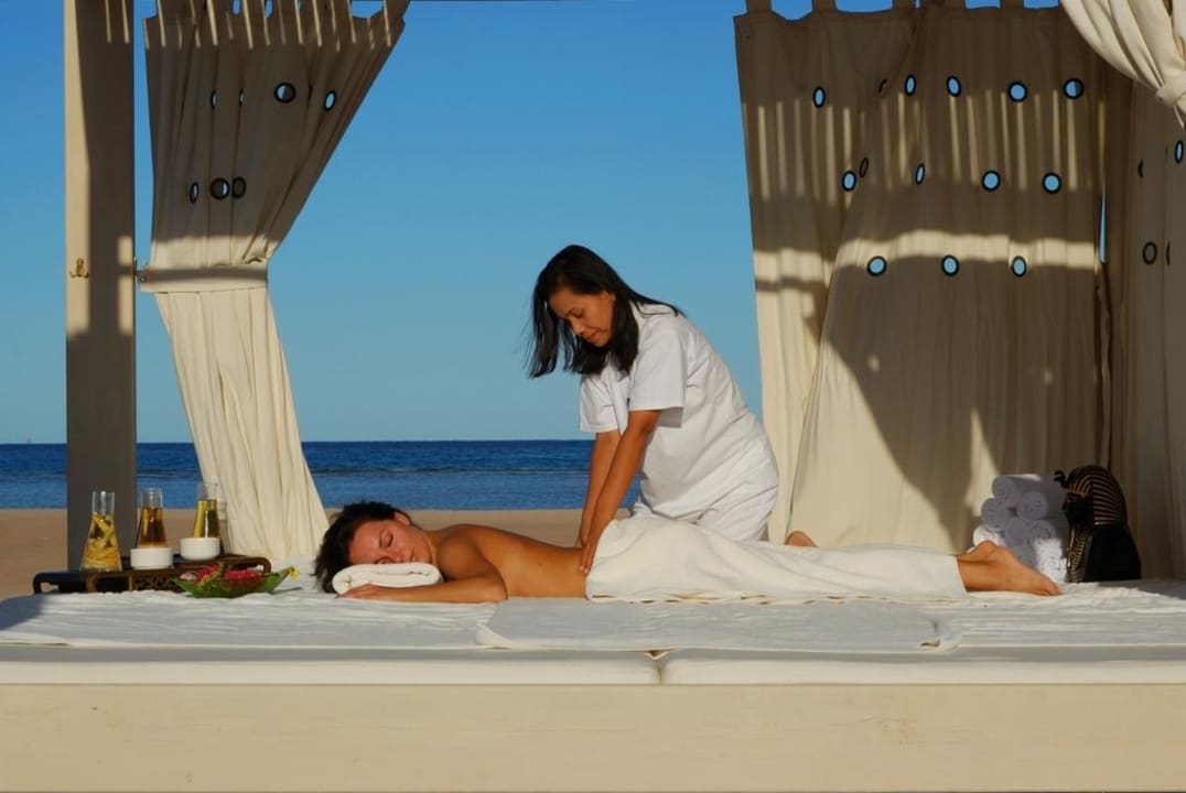 Beach massage Premier Le Reve Hotel & Spa
