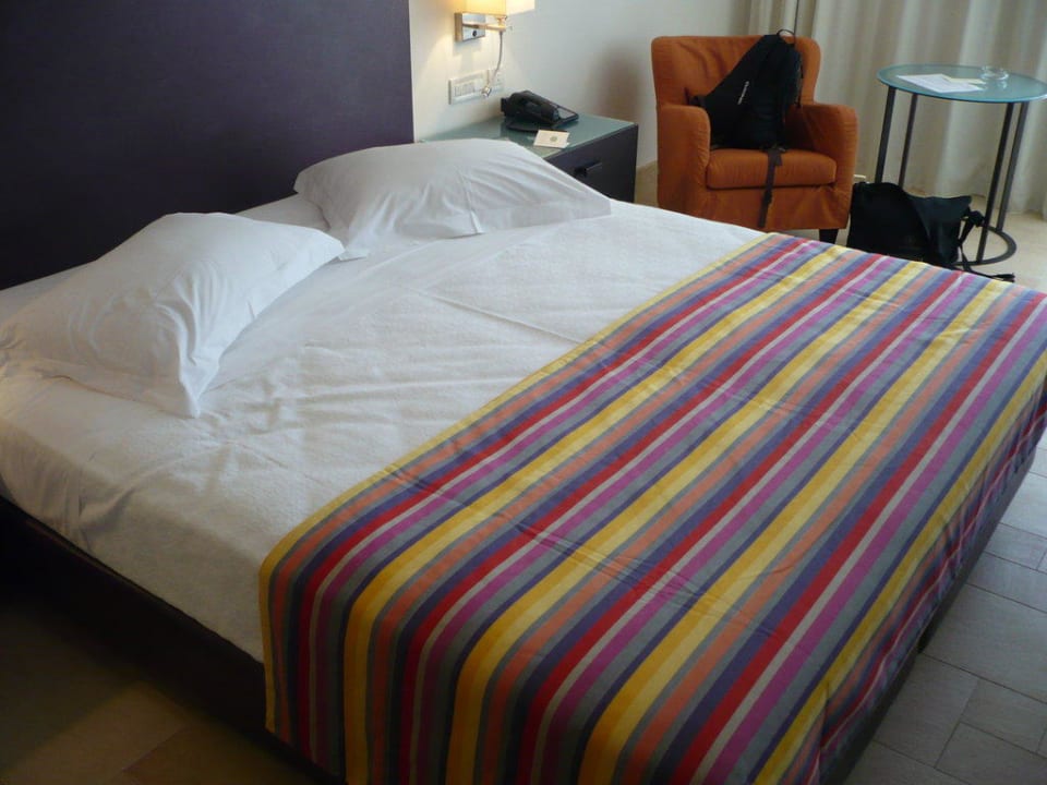 Bett im Bungalow Kernos Beach Hotel & Bungalows