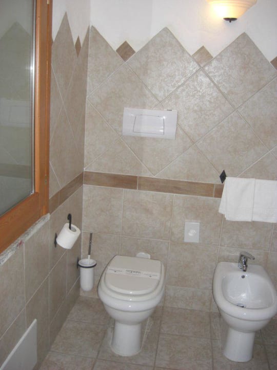 Badezimmer Park Hotel Cala di Lepre & Spa