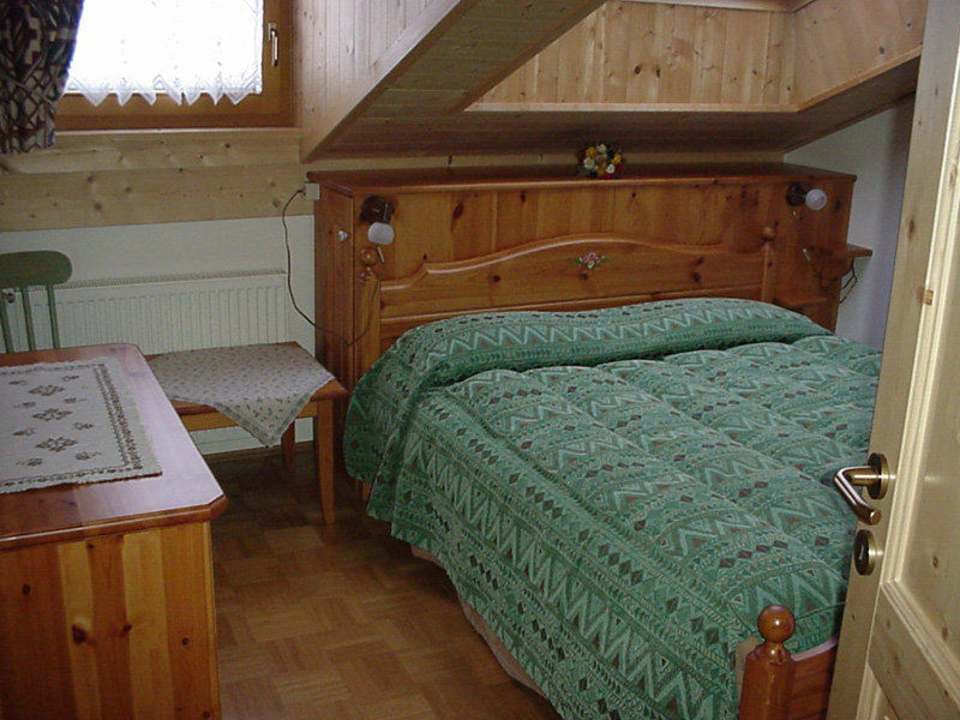 Letto mansarda trilocale Bachlaufen Haus Casa Vacanze