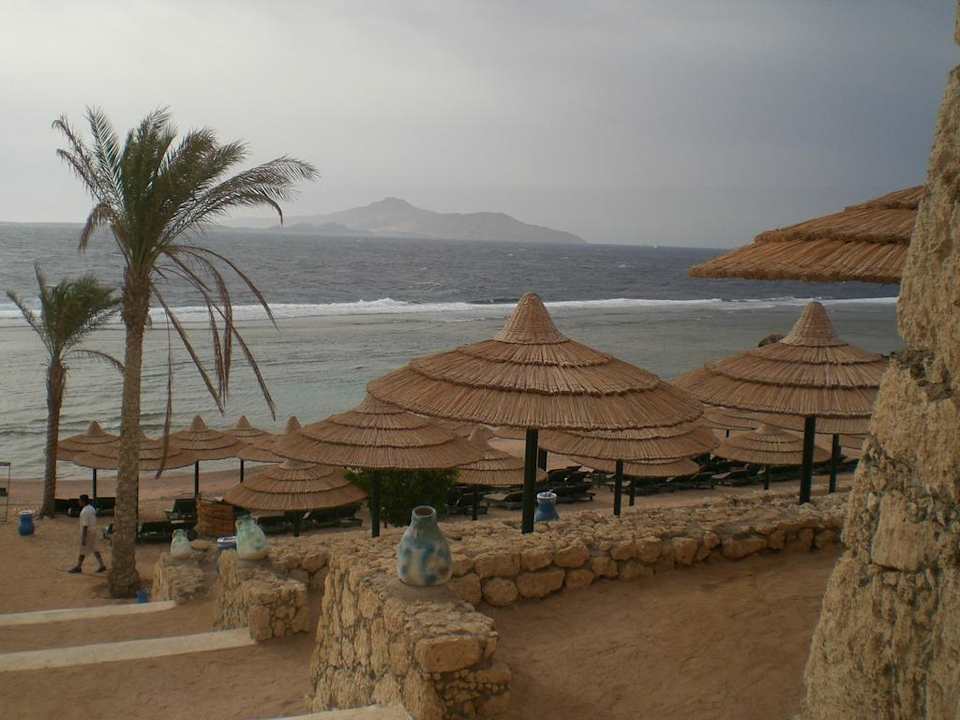 Un lato della spiaggia Hotel Hauza Beach Resort