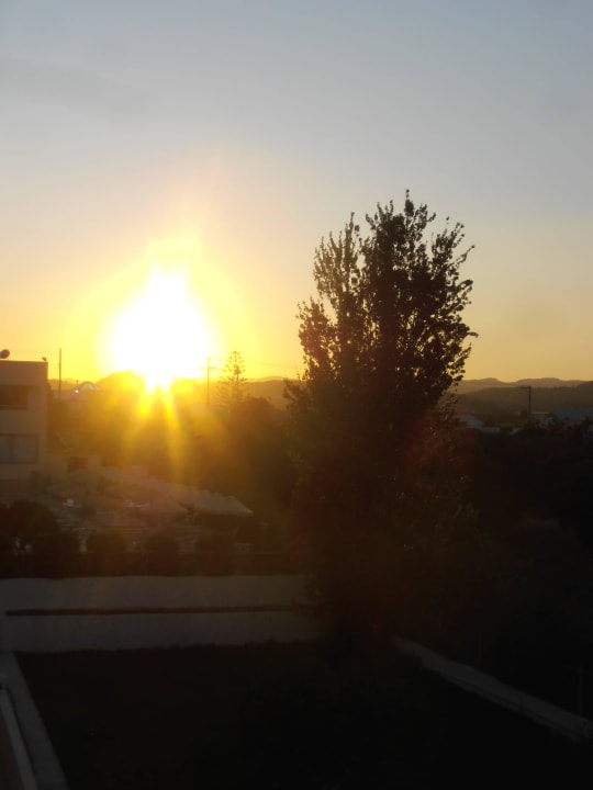 Sonnenuntergang Hotel Memphis Beach