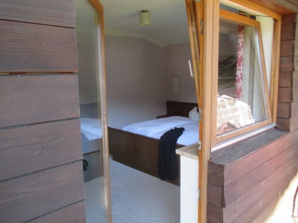 Schlafzimmer, von Balkon aus Apartments Tannheim