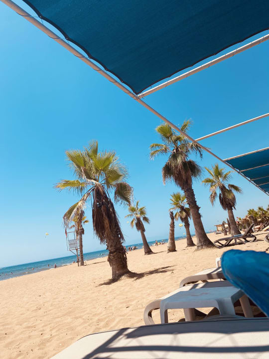 Strand Club Grand Side