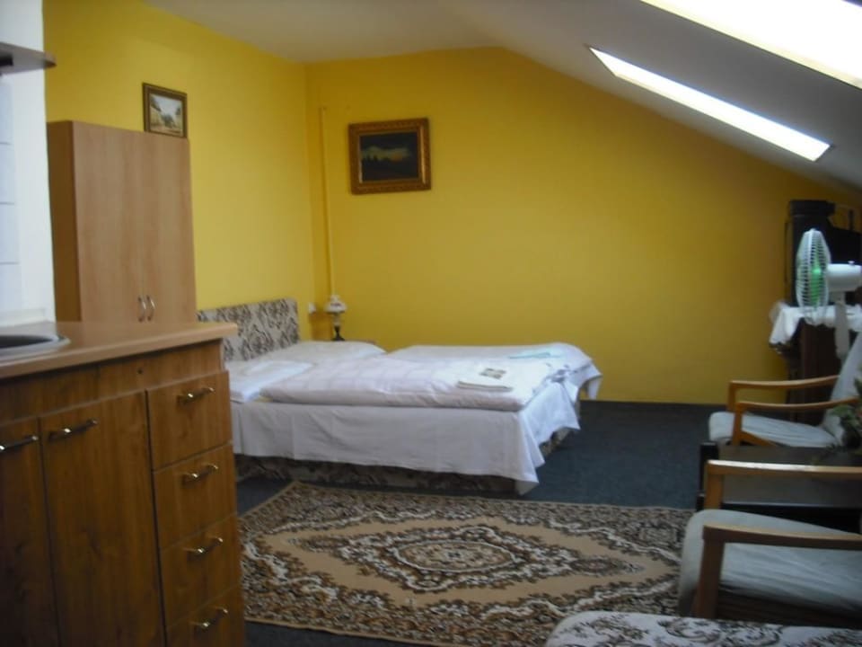 Třílůžkový pokoj s kuchyní Penzion U Holubů Nový Jičín