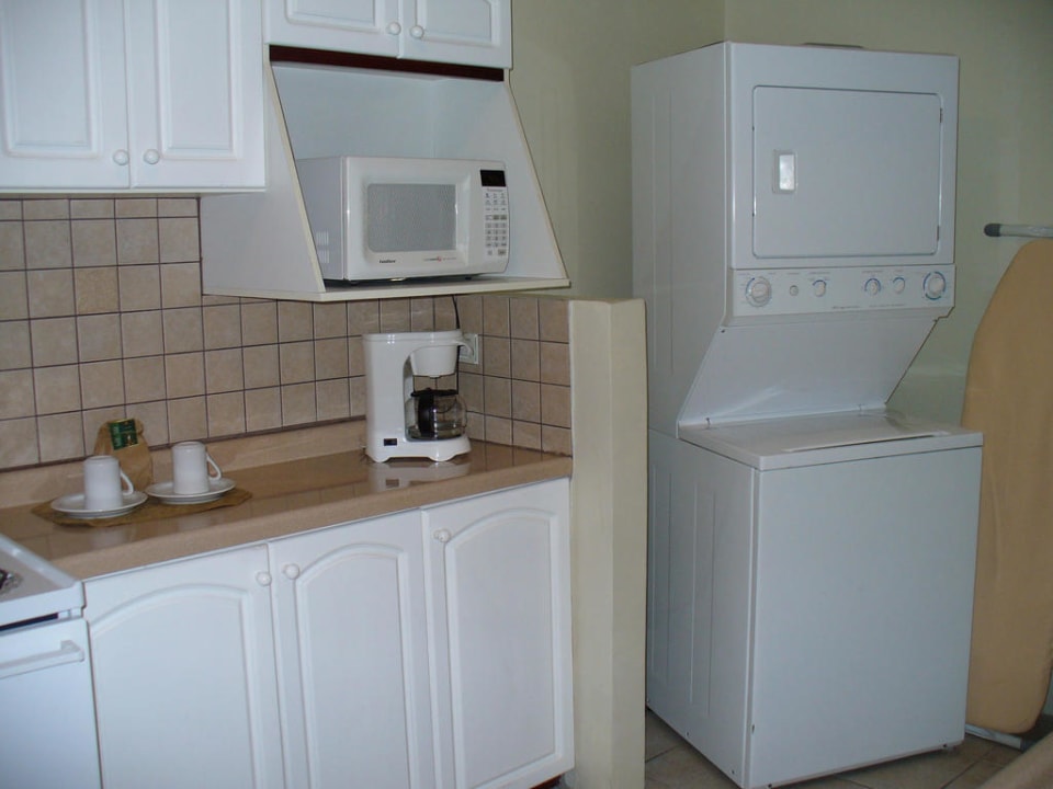 Küche mit Waschmaschine, Trockner, Mikrowelle Hotel Casa Conde