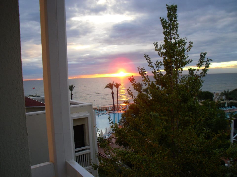 Sonnenuntergang über dem Meer PALOMA Perissia