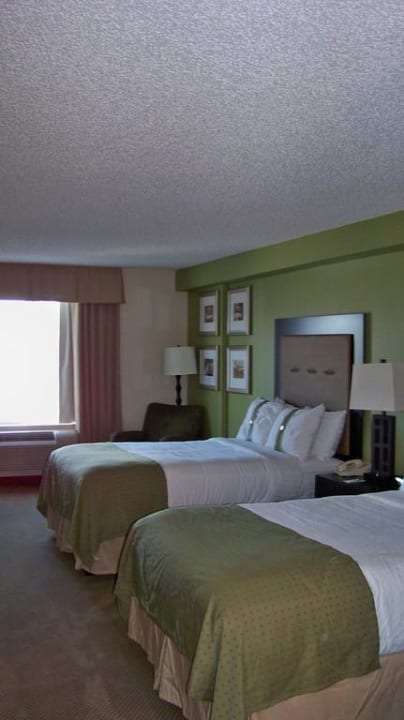 Sehr gemütliche Betten Holiday Inn Hotel & Suites Across From Universal Orlando