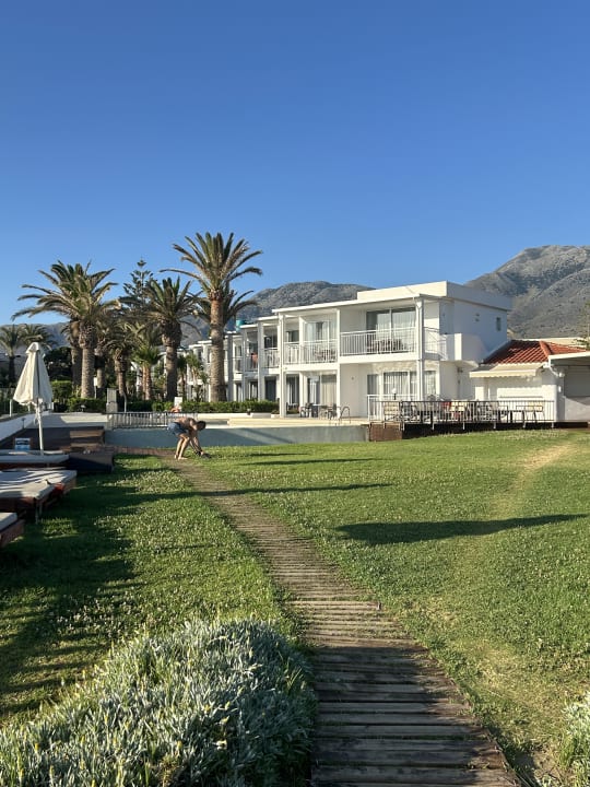 Gartenanlage HARPIN Happy Days Beach Hotel