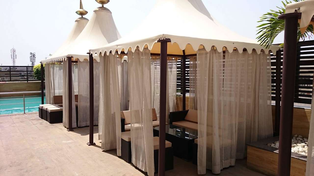Cabanas by pool Hilton Jaipur