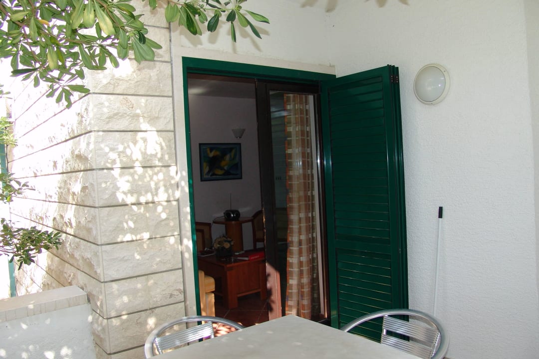 Balkon mit Blick aufs Zimmer Villa Margitta