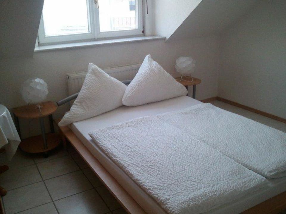 Familienzimmer  Schlafzimmer  Hotel Schützen