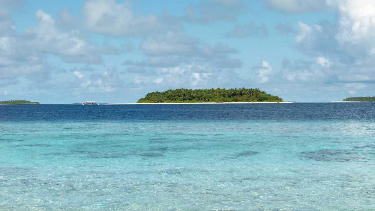 Ausblick von der Liege am Strand NH Collection Maldives Reethi Resort