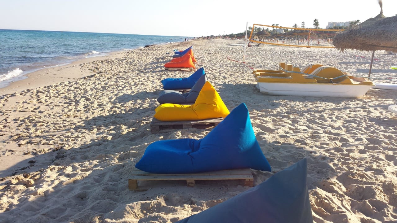 Relaxing in front of the beach Hotel Royal Nozha