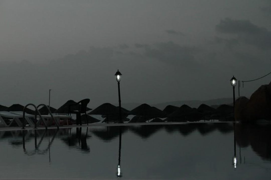 Swiming pool in the evening Aska Hotel Just in Beach
