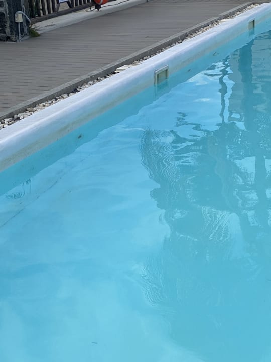 Pool Le Peninsula Bay Beach Resort & Spa