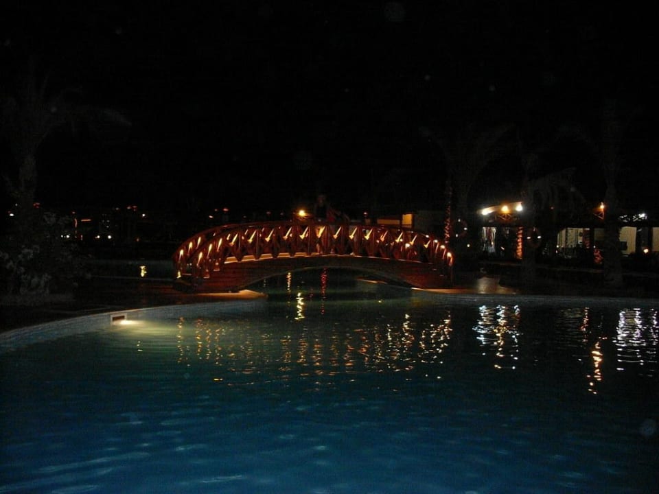 The pool at night Riviera Aqua Park Resort