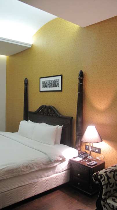 Bett RAMADA Khajuraho Hotel