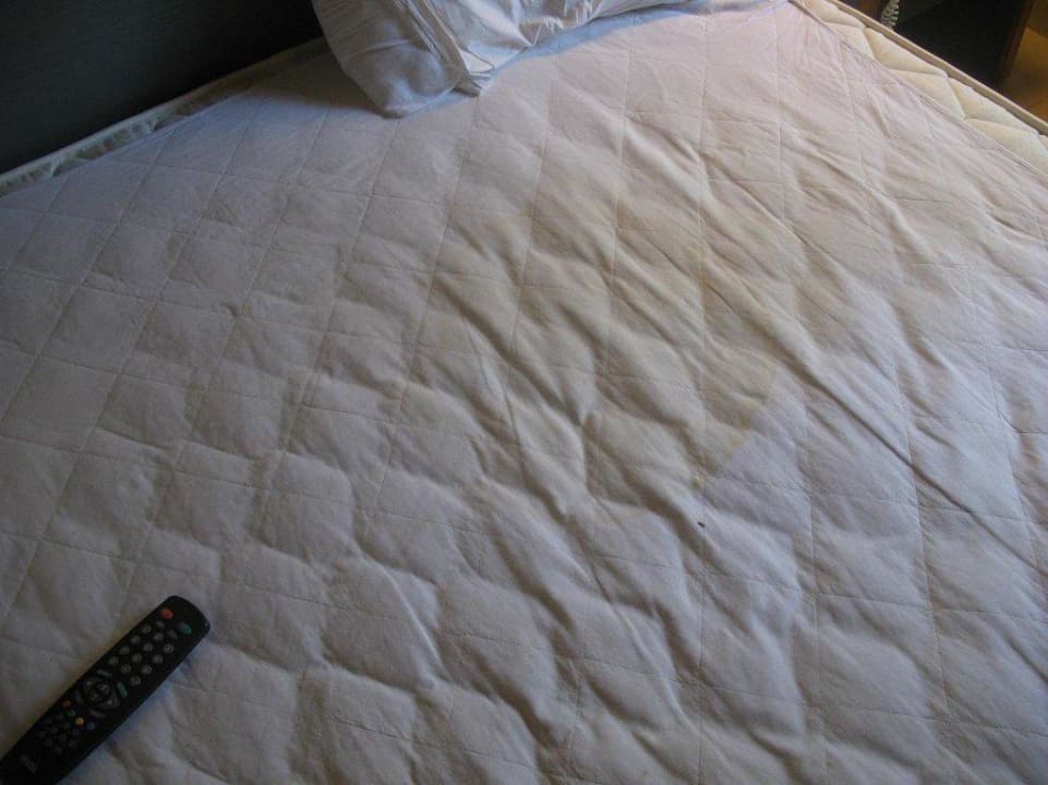 Łóżko w sypialni Hotel Pine Bay Holiday Resort