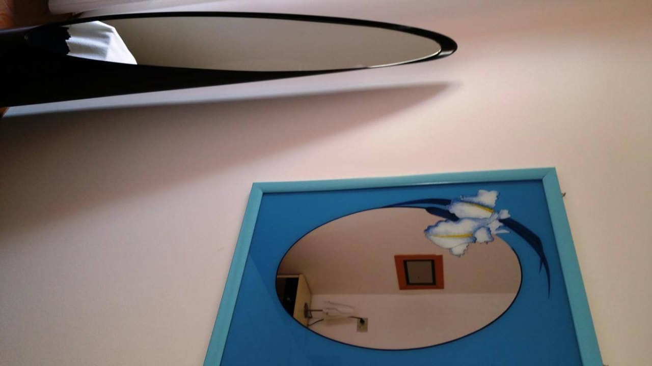 Spiegel im Schlafzimmer Appartamenti Pia del Faro