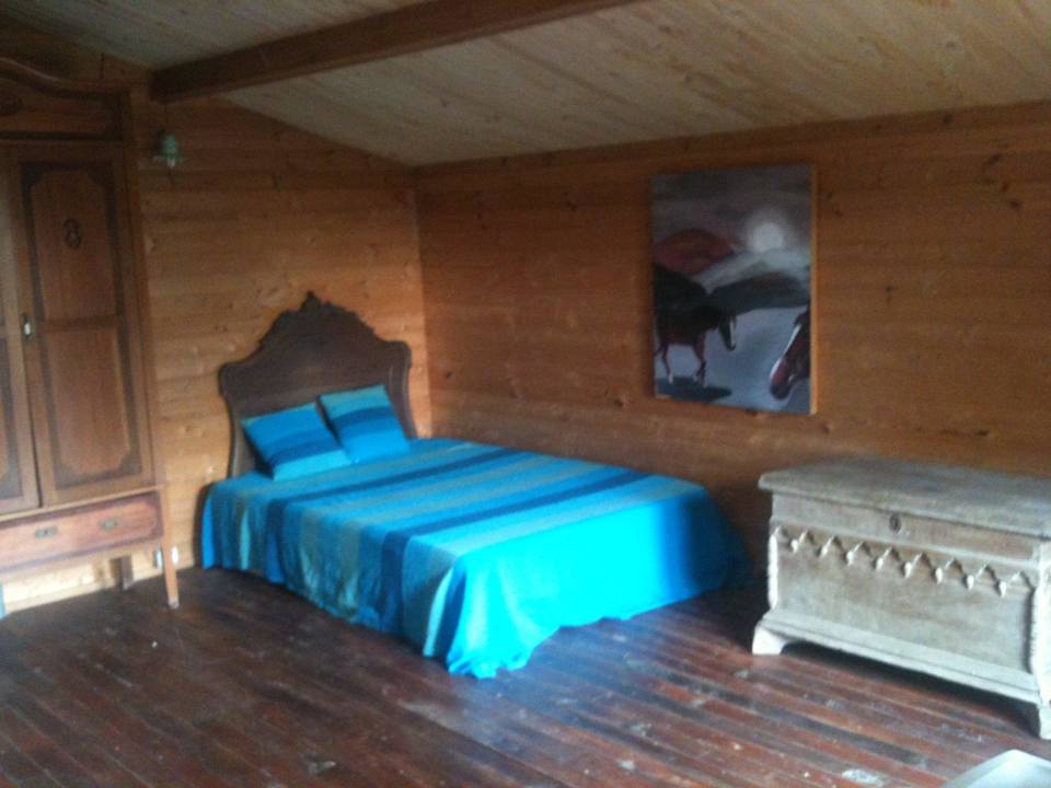 Swiss cabin bedroom Casa del Paso