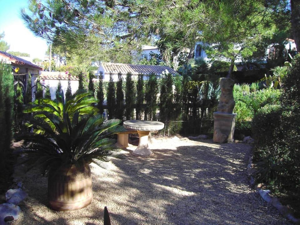 Sitzecke im Garten El Refugio Villa Rosa