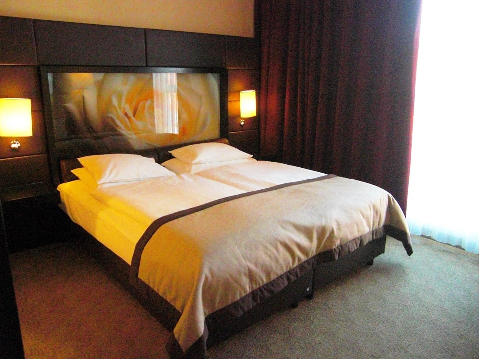 Ein bequems Doppelbett Lindner Hotel Vienna Am Belvedere, part of JdV by Hyatt