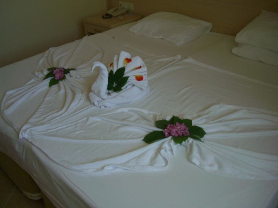 Наша постель после уборки номера Selectum Family Resort Side