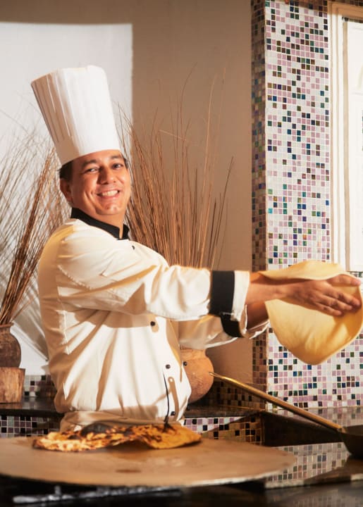 One of the chefs Neptune Village Beach Resort & Spa
