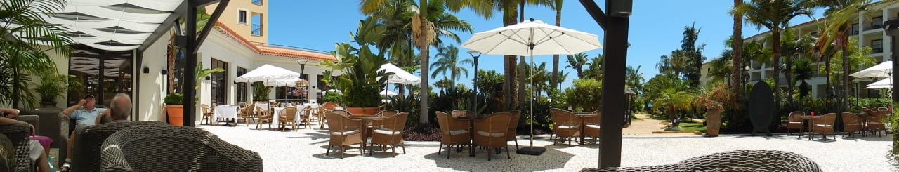 Panoramablick in den Garten Hotel Porto Mare - PortoBay
