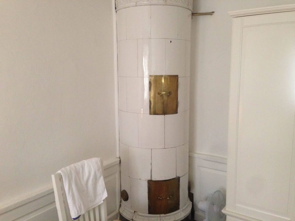 Kachelofen (ohne Funktion) im Schlafzimmer Apartment ApartDirect Gamla Stan